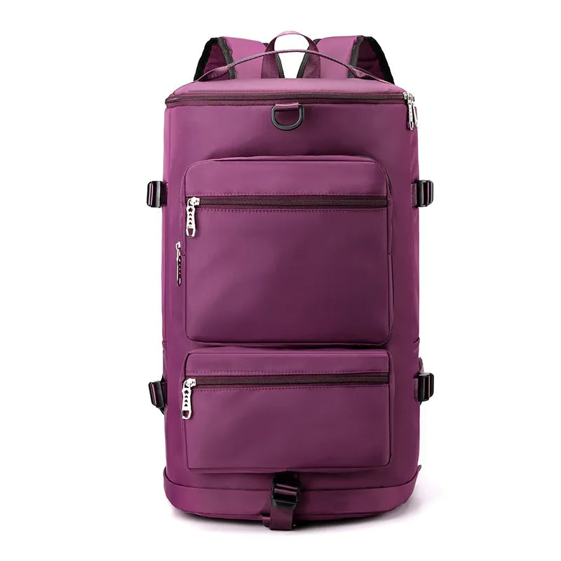 Large travel backpack with two front zip pockets and top handle, plum purple