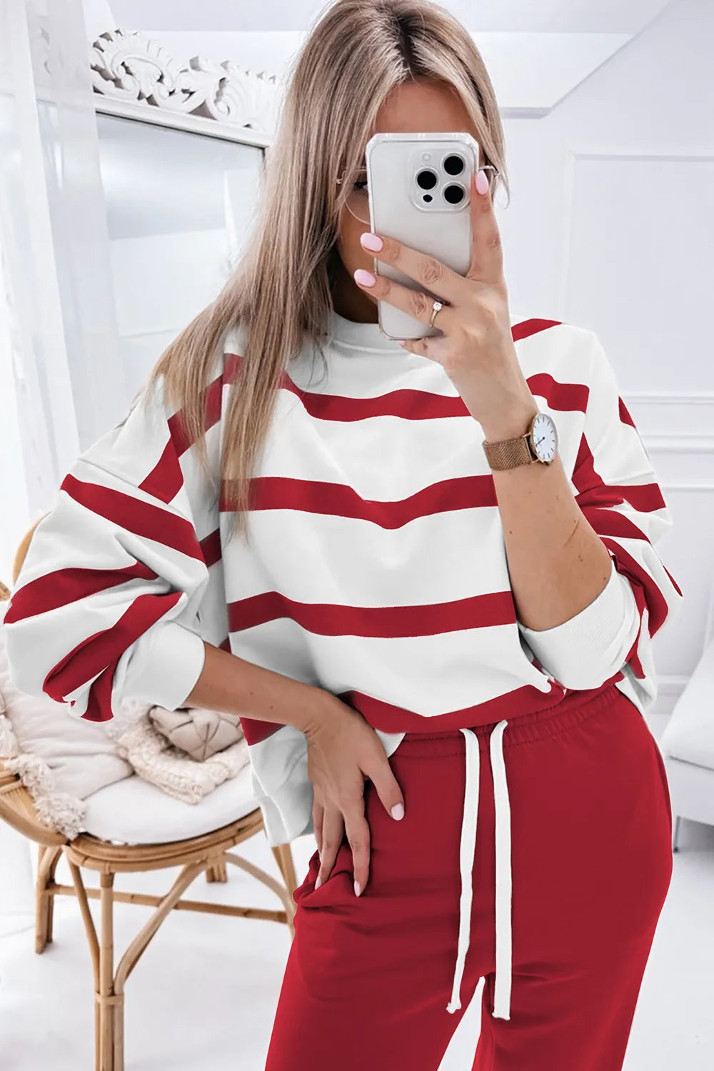 Red-and-white striped long-sleeve top with red jogger pants set