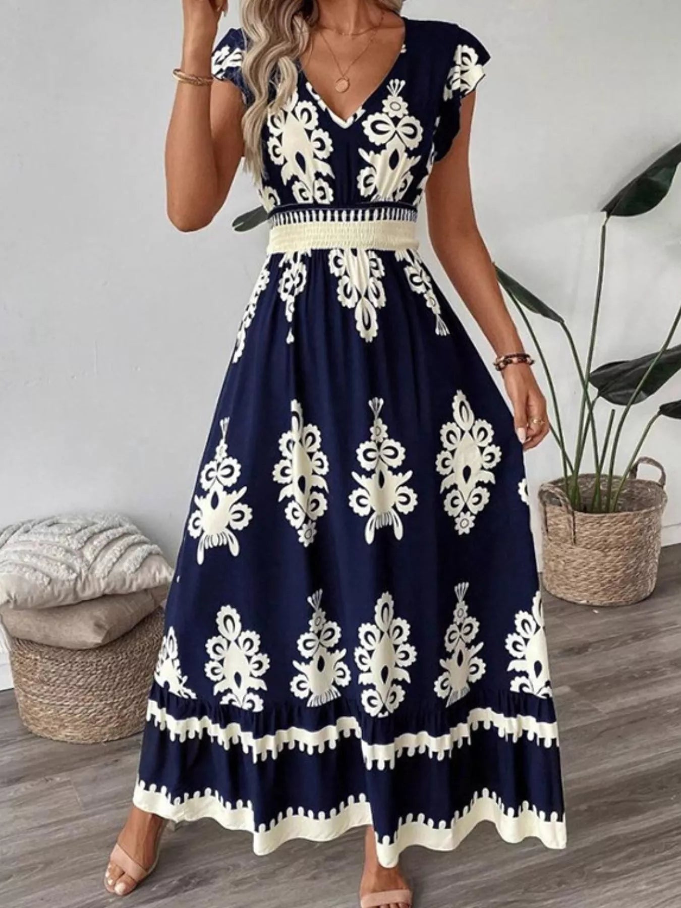 Dark navy ruffled V-neck maxi dress with cream floral damask print and smocked waist