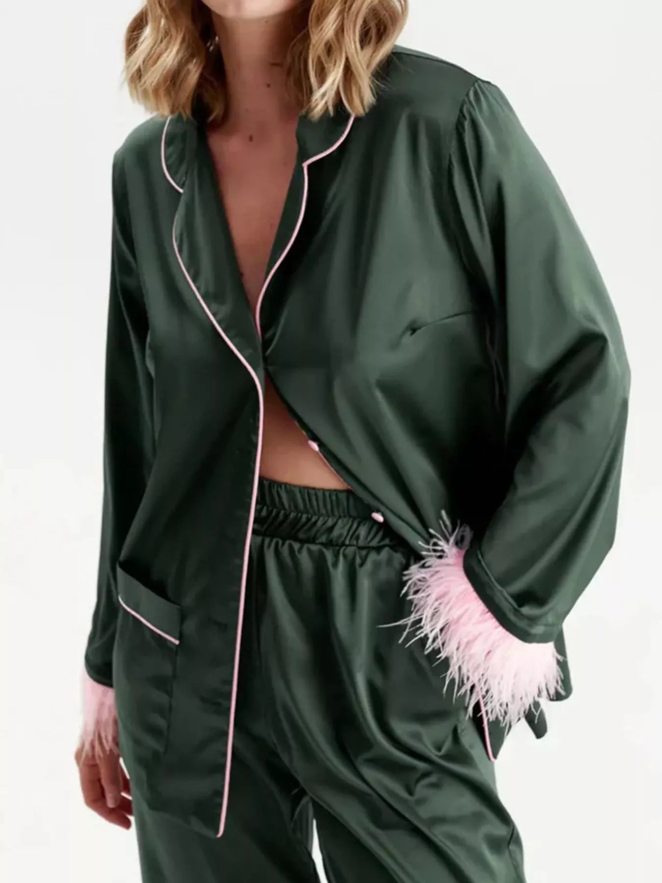 Silky sage green lounge set: button-up top and pants with pink piping and feather cuff