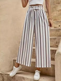 Striped wide-leg pants with elastic waistband and tie, vertical black-and-lavender lines