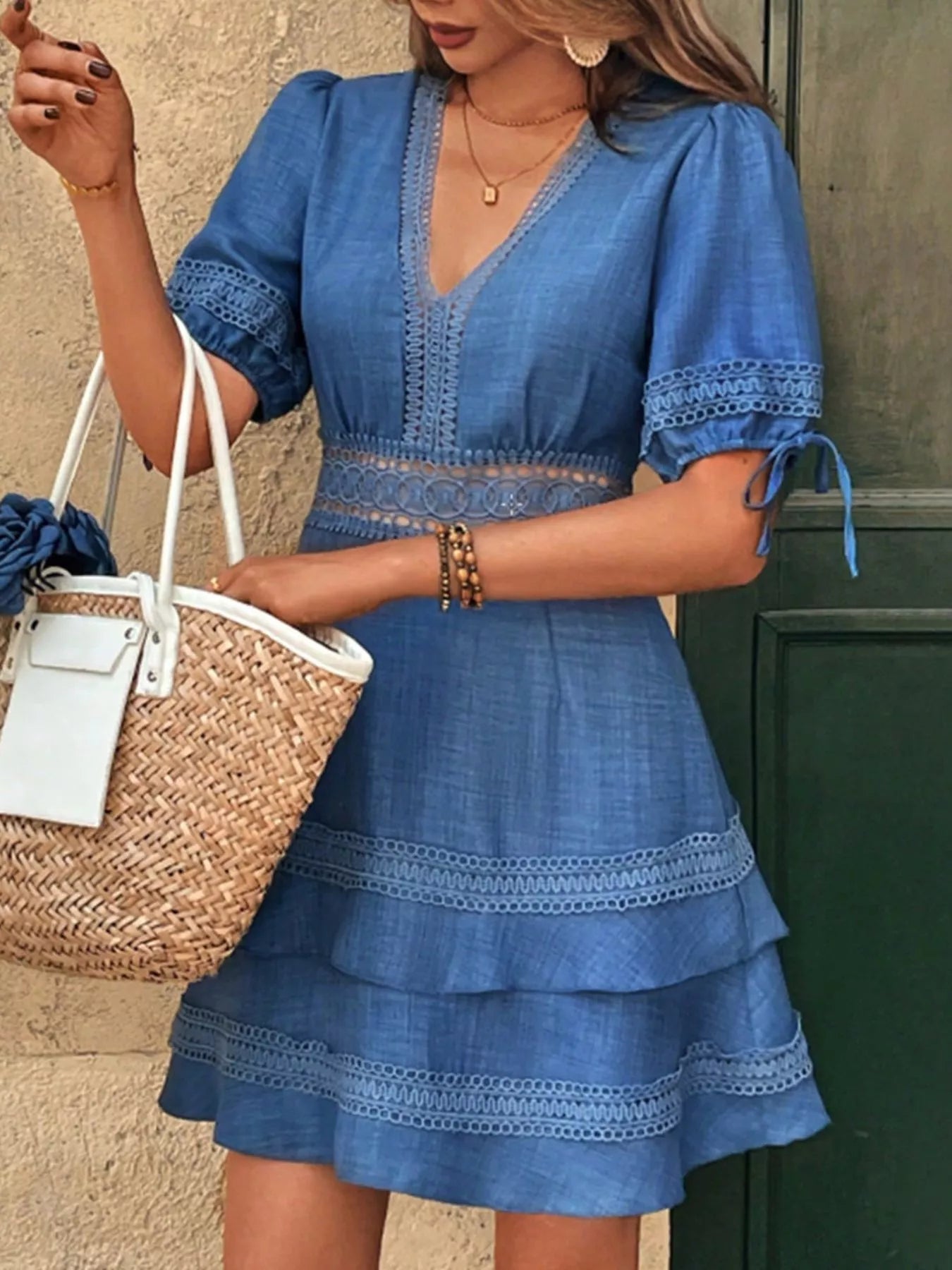 Blue V-neck mini dress with lace-trim tiered skirt and half sleeves