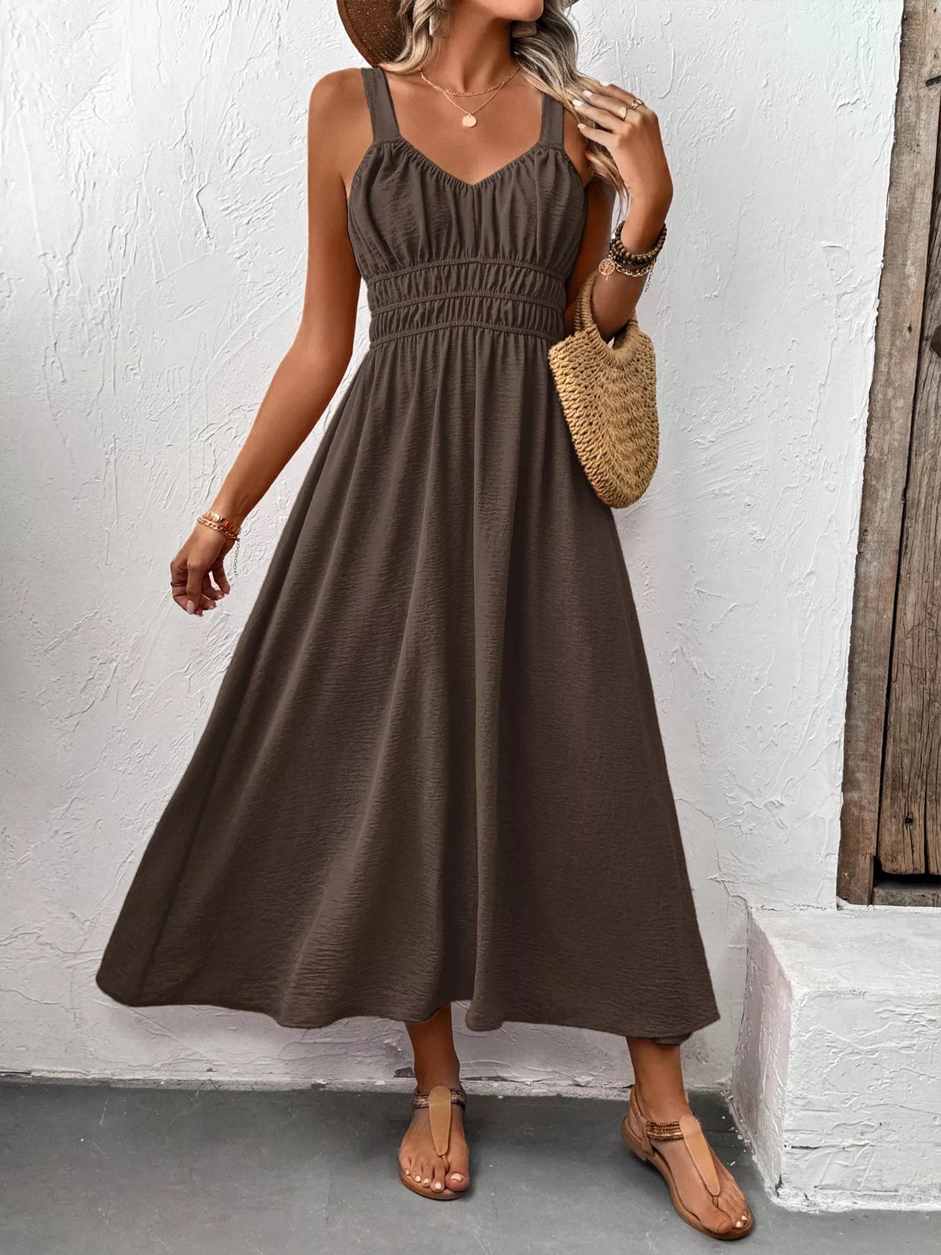 Cedar & Moore Sleeveless smocked casual midi dress in taupe with wide straps.