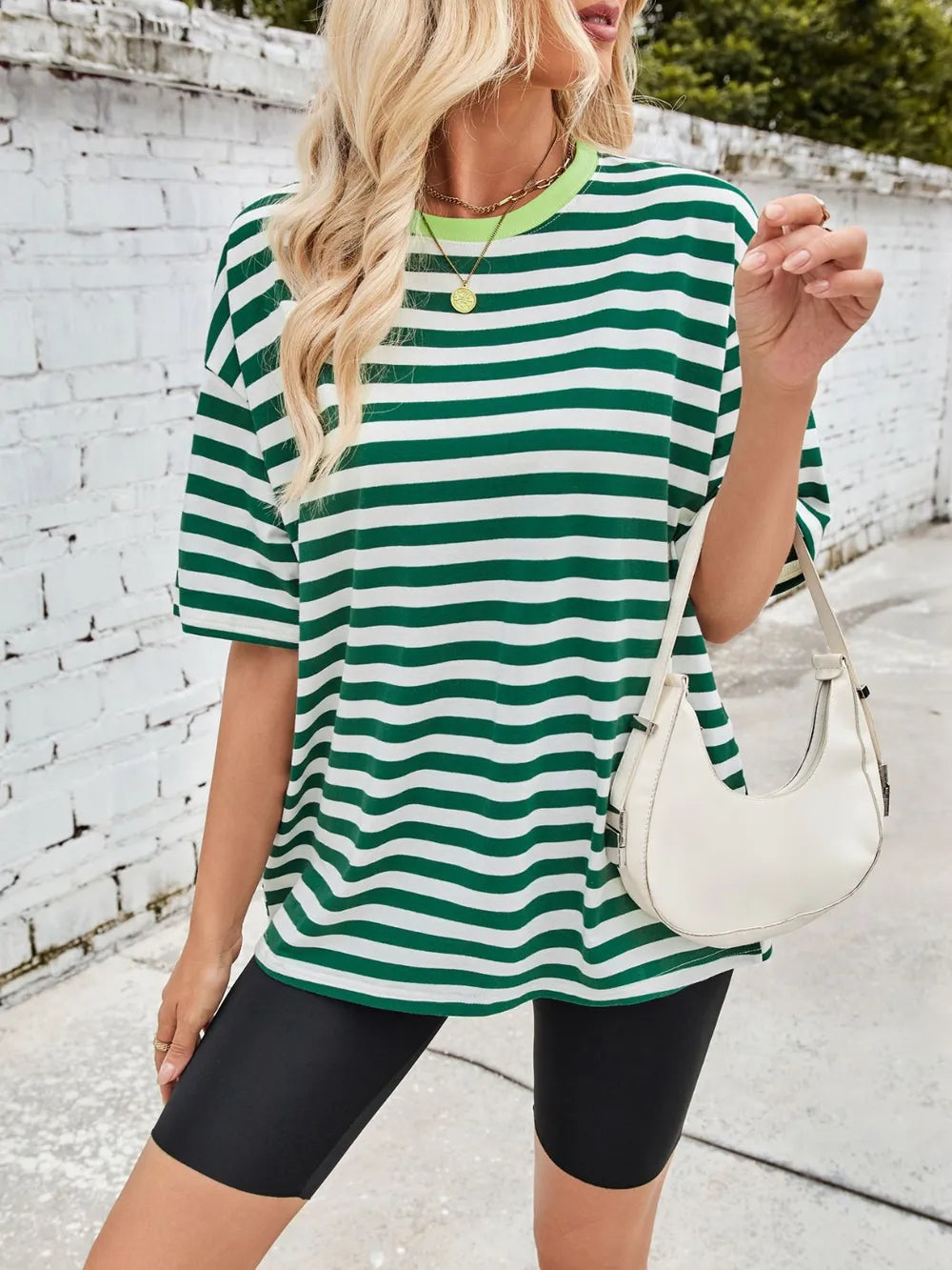 Dark green and white striped round-neck short-sleeve T-shirt, front view