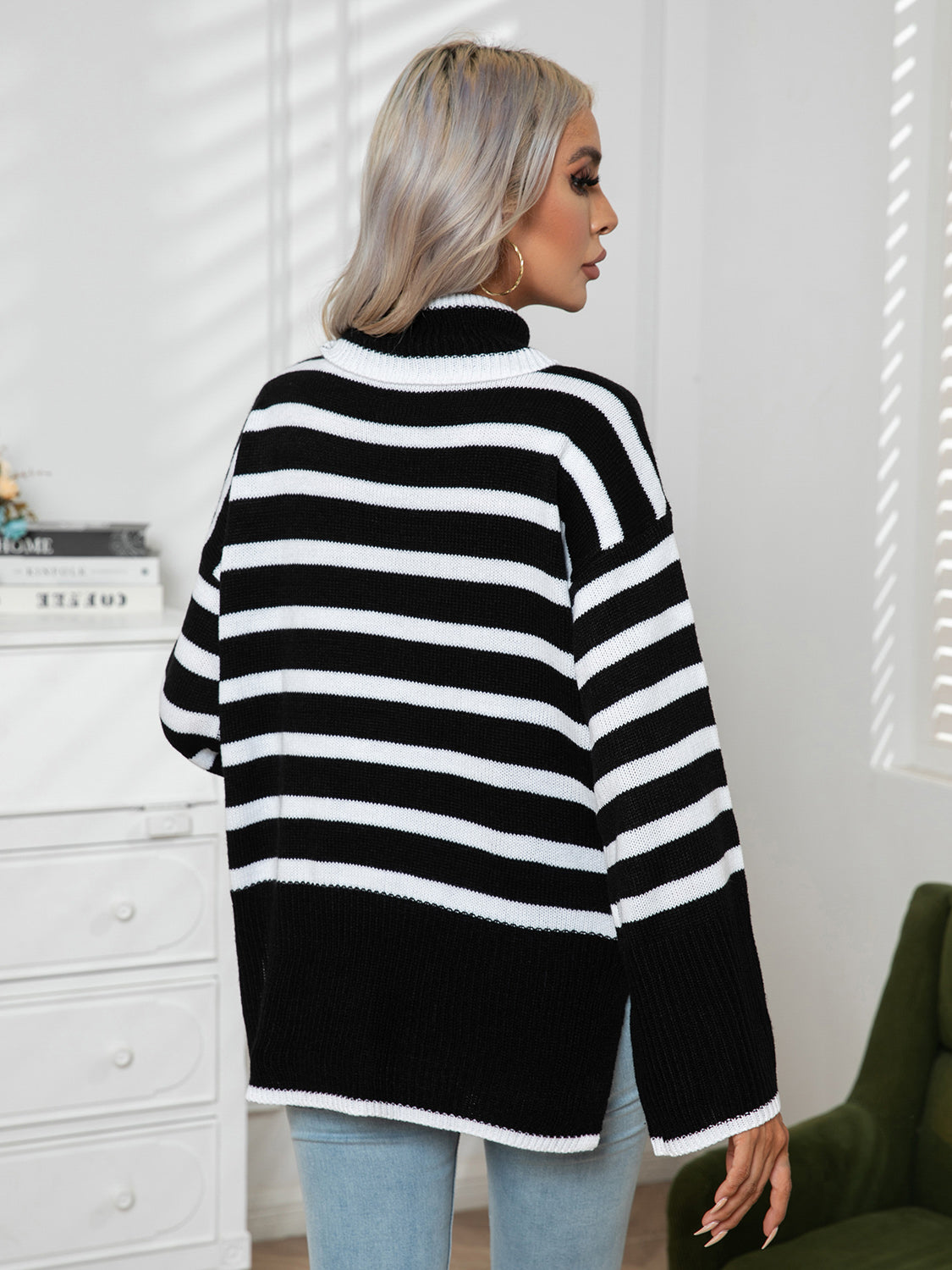 Black-and-white striped turtleneck sweater, drop-shoulder fit, ribbed cuffs and hem