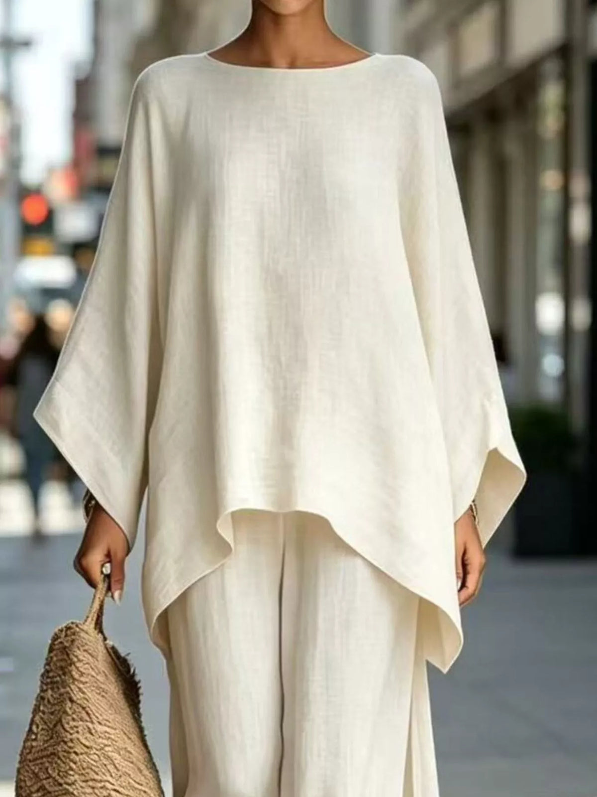 Two-piece batwing top and wide-leg pants set, light cream draped batwing blouse overlay