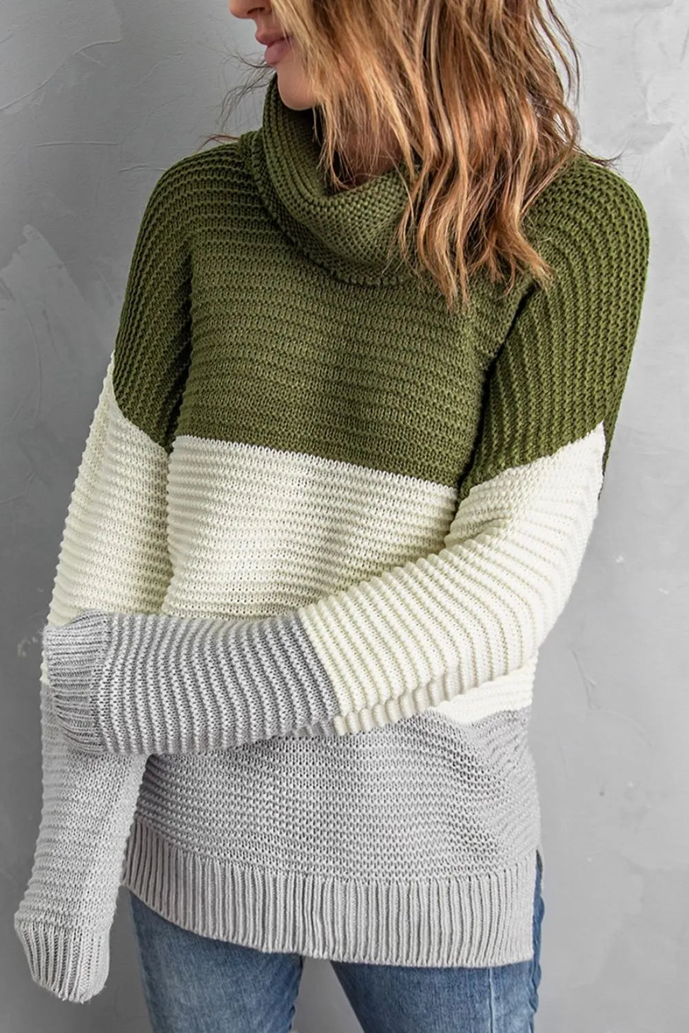 Color-block turtleneck sweater, moss green back with cream and gray sections; long sleeves