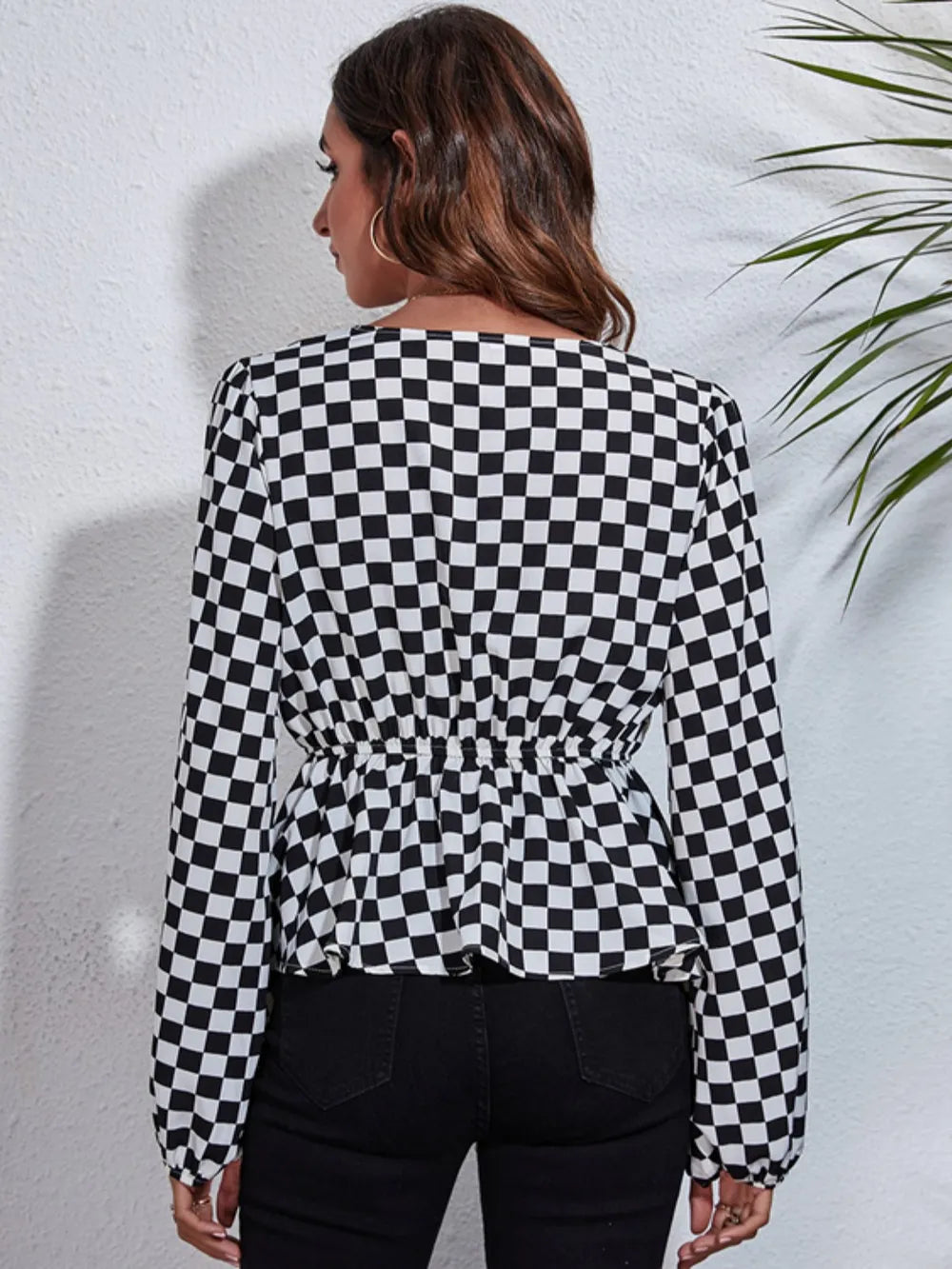 Checkered peplum blouse, V-neck back view with balloon sleeves, black and white