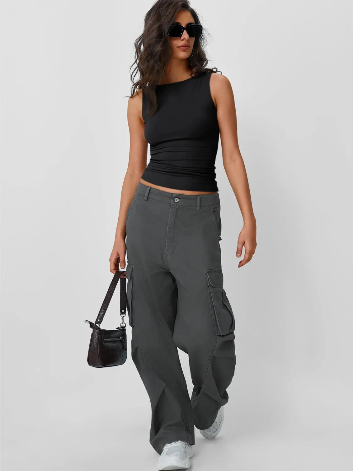 Black sleeveless round neck tank top, fitted silhouette