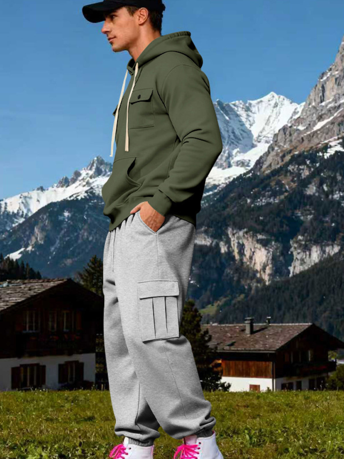 Two-piece kangaroo hoodie set: army green hoodie and light gray cargo sweatpants, side view