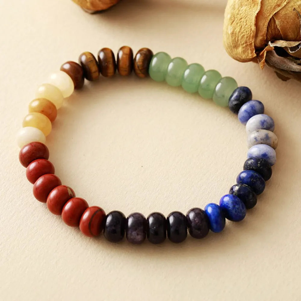 Multicolor natural stone bead bracelet with blue, green, red, cream, and black beads