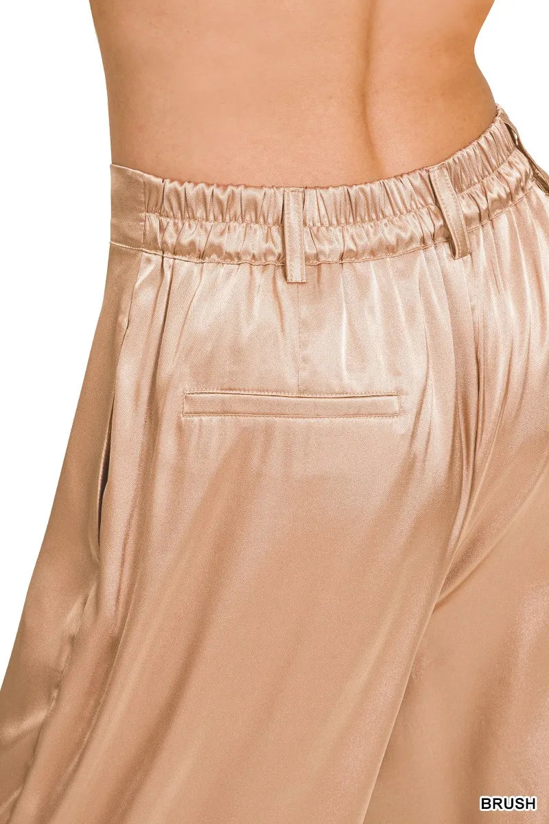Satin wide-leg pants with elastic waist, flat front, and patch pocket