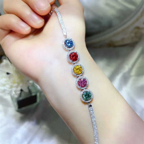 925 sterling silver bracelet with red, blue, yellow, pink, green gemstone charms