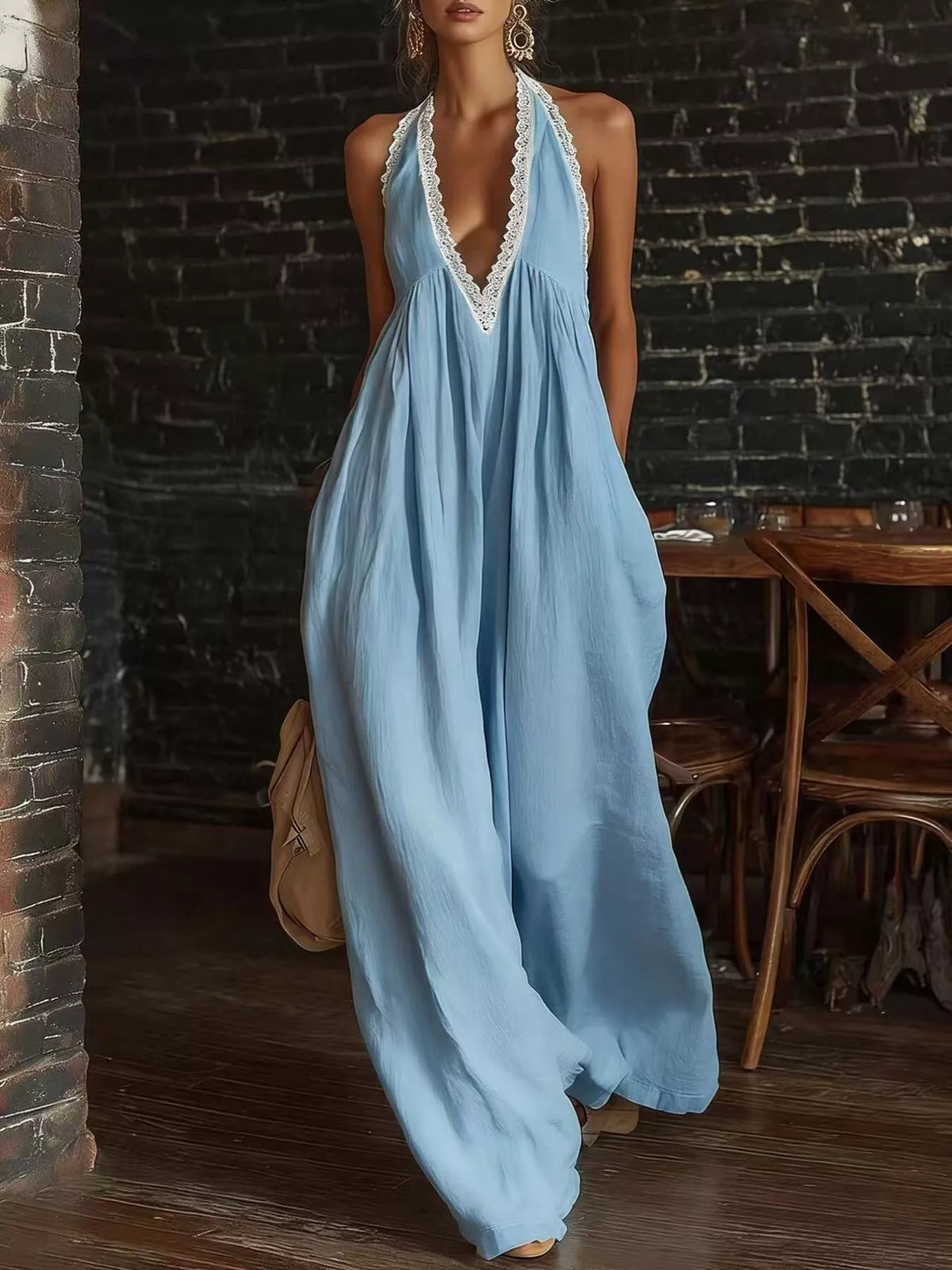 Light blue halter neck lace-trim wide-leg jumpsuit with deep V neckline and loose fit