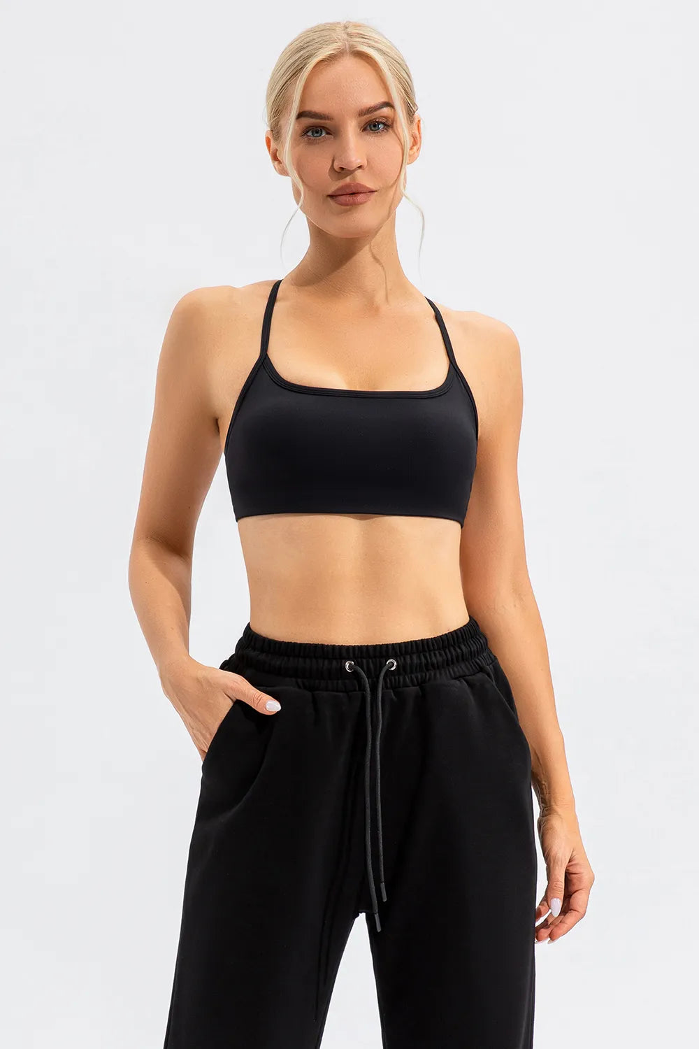 Black active spaghetti strap cami with square neckline and cropped length