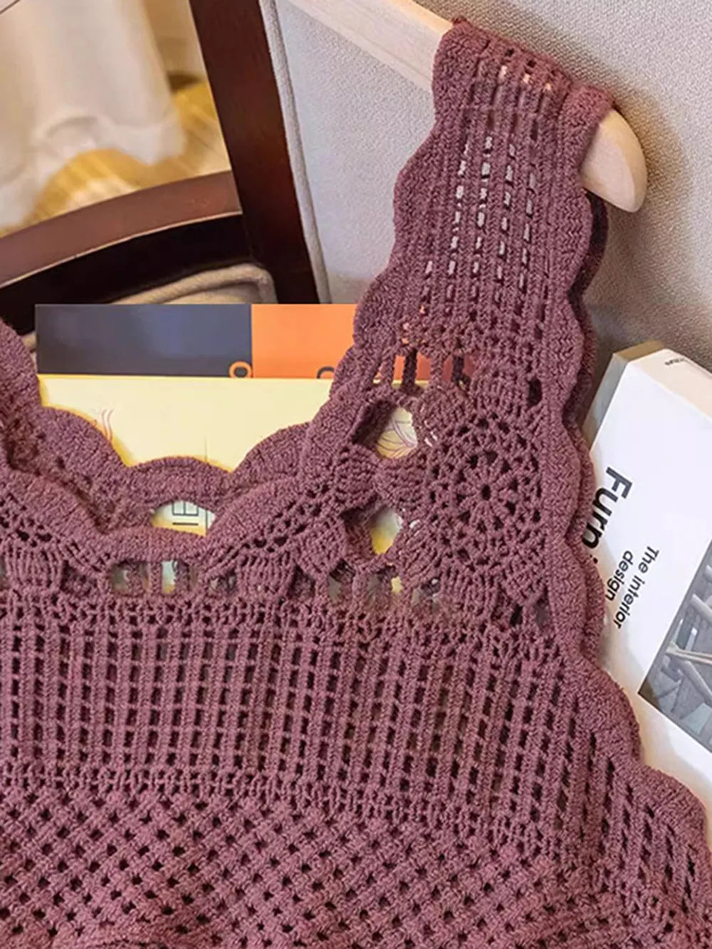 Scoop neck openwork tank in mauve with patterned knit panels and sleeveless design