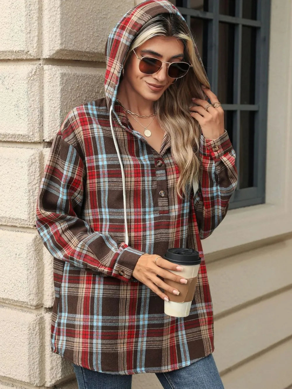 Multicolor plaid hooded long-sleeve top with drawstring, button front, and front pocket