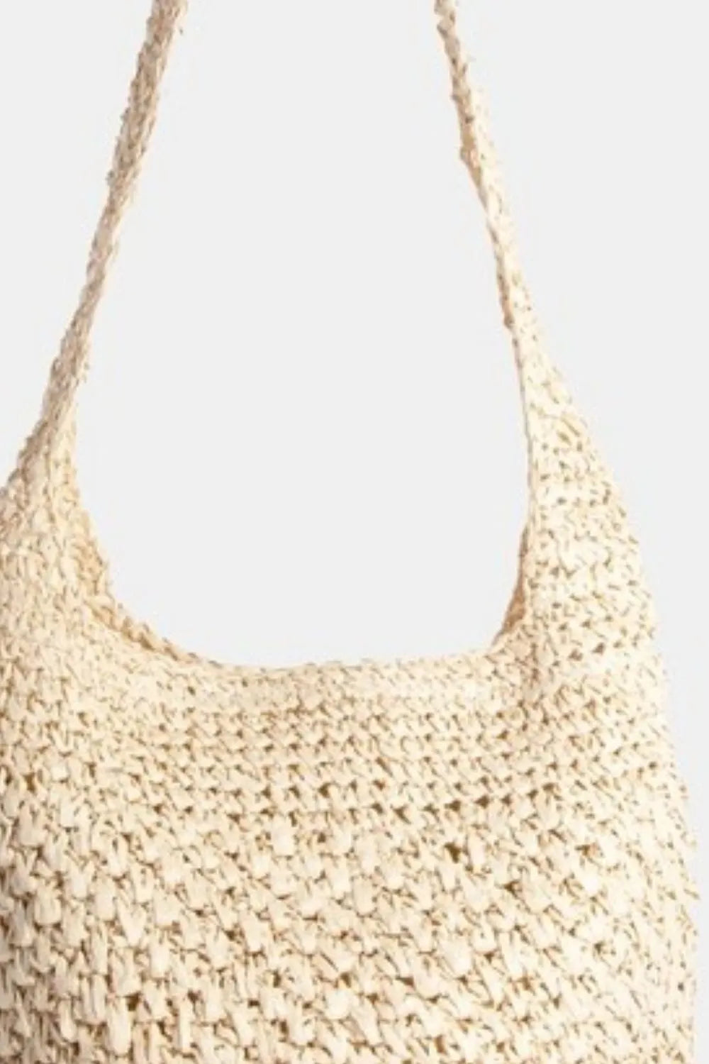 Pastel yellow braided hobo shoulder bag close-up of textured stitch and handle straps