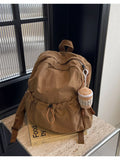 Cedar & Moore casual nylon drawstring backpack, large, tan color.