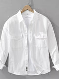 White plus size button-up long sleeve shirt with two chest pockets