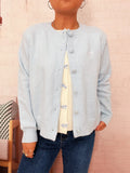 Light blue long-sleeve cardigan with round neckline and button-front closure