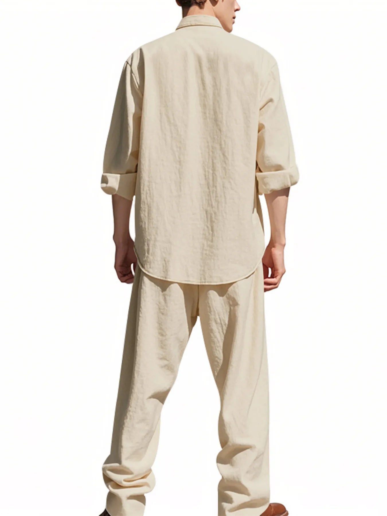 Grey button-up shirt and pants set with long sleeves, collar, and front buttons