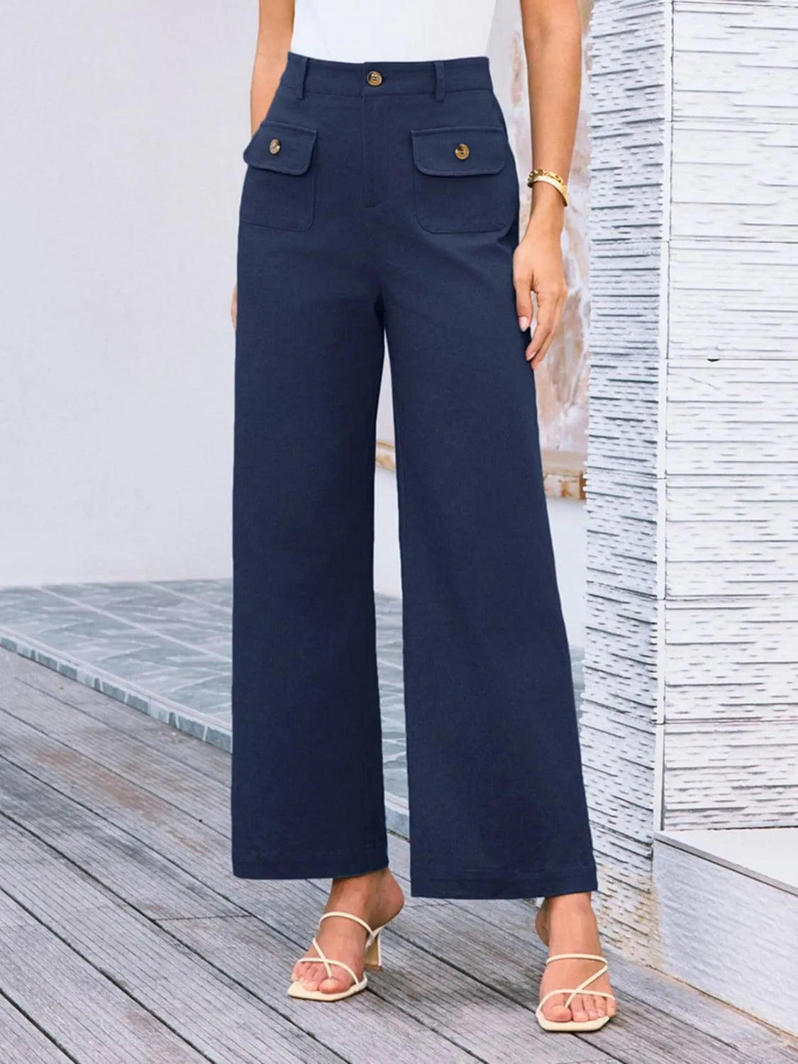 High waist wide leg pants in dark blue with front button and two flap pockets