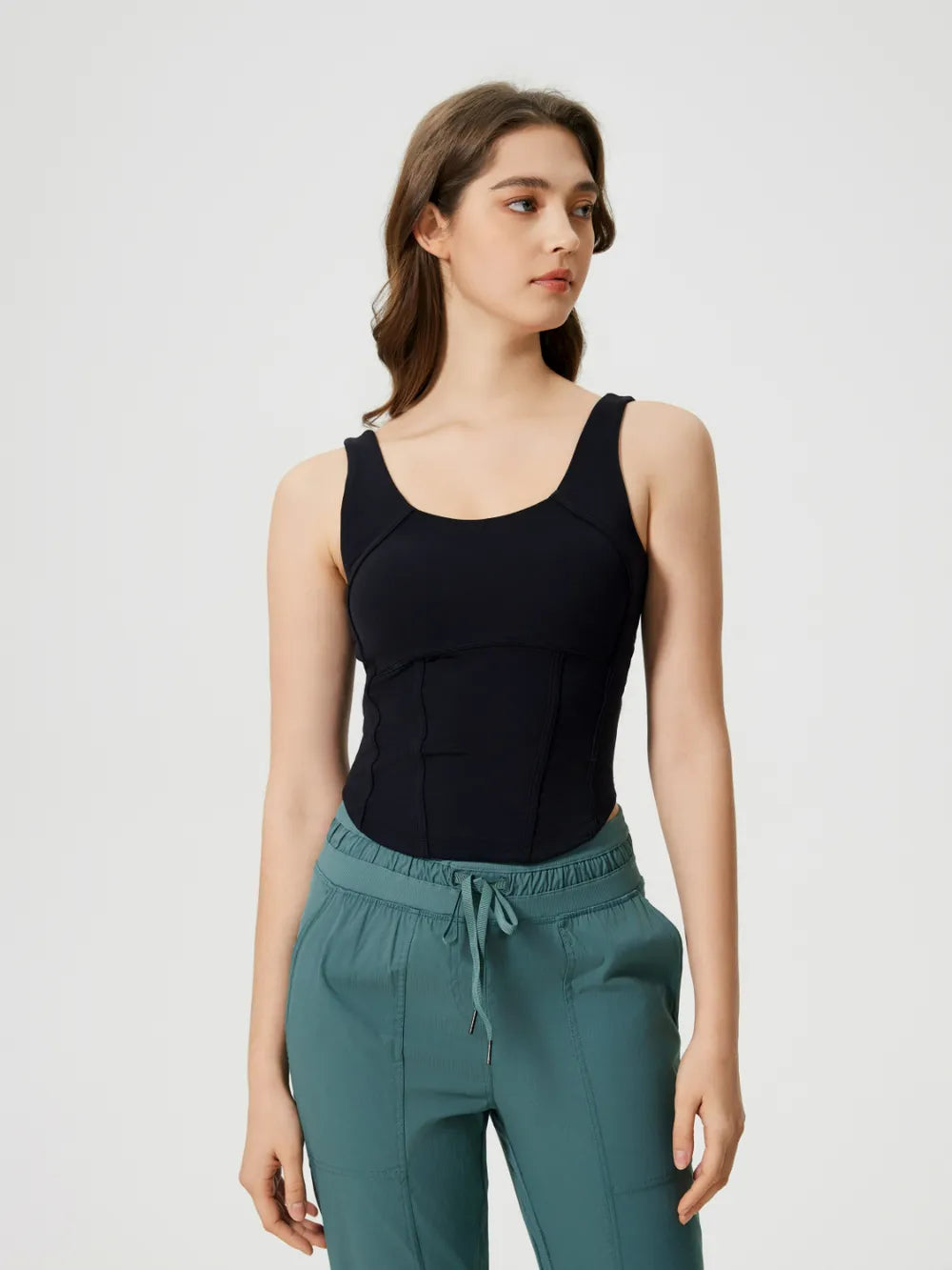 Black active tank top with wide straps and low scoop back