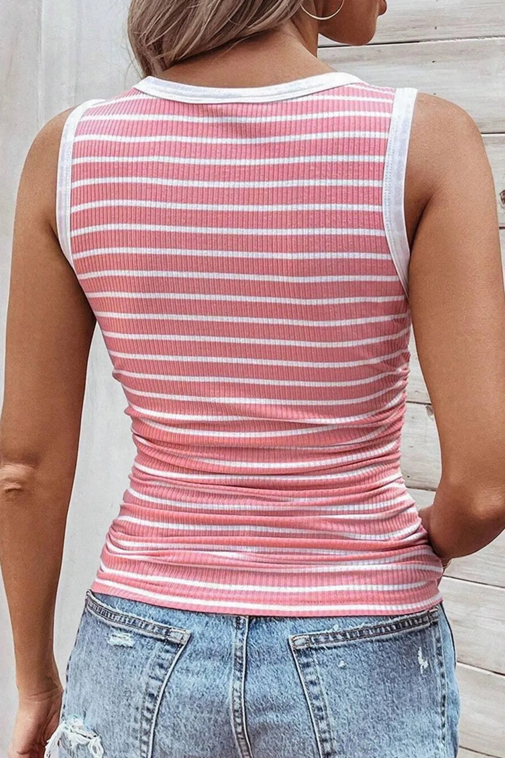 Back view of pink and white striped round-neck sleeveless tank top