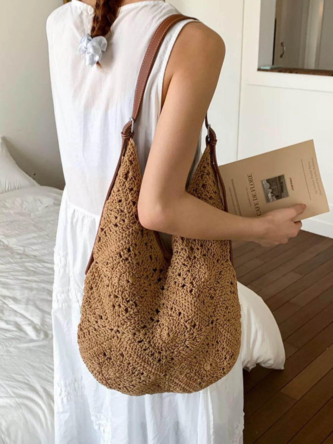 Camel crochet shoulder bag with brown leather straps and roomy slouch shape