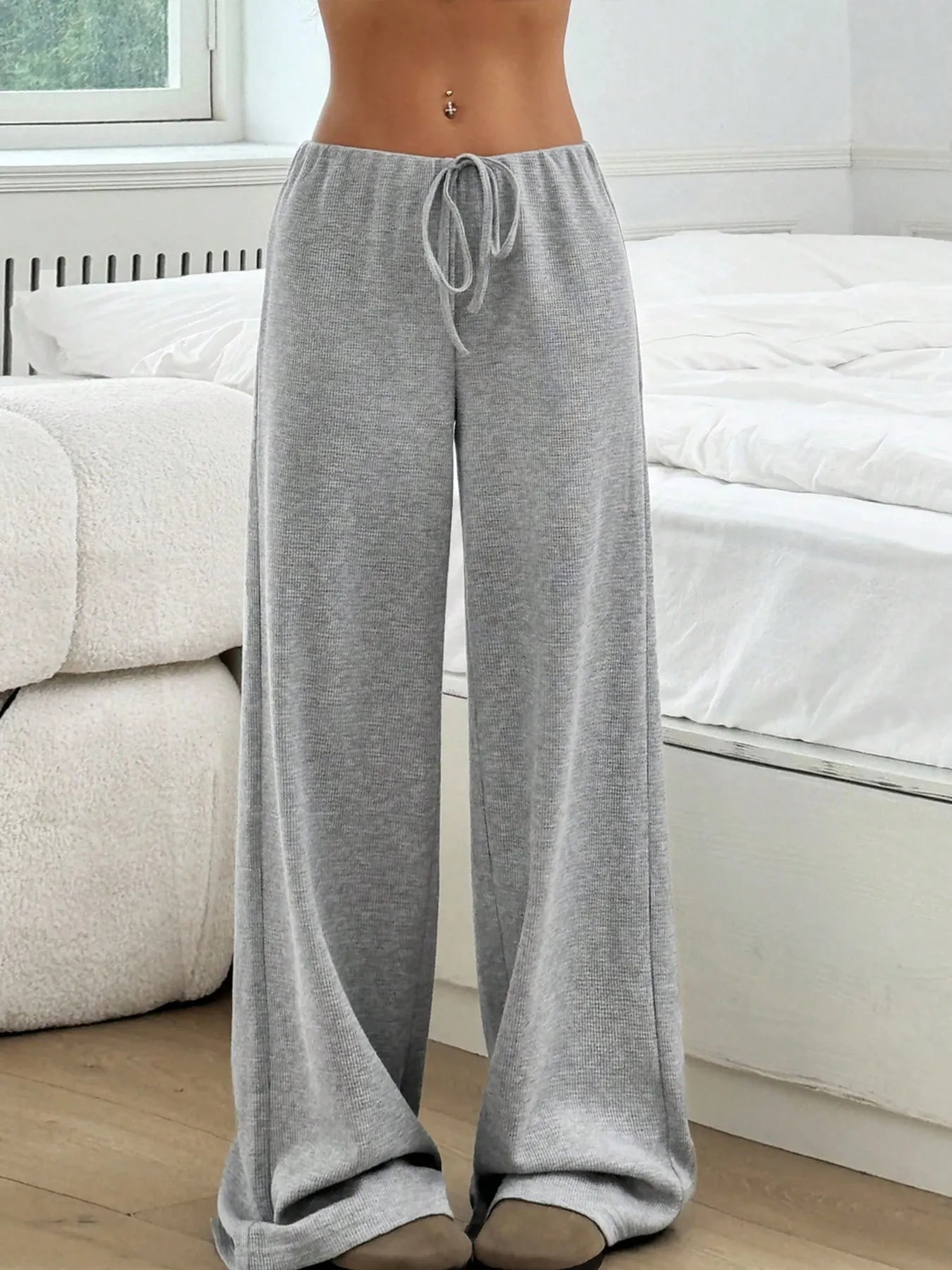 Heather gray wide-leg drawstring pants with knot-tied waistband