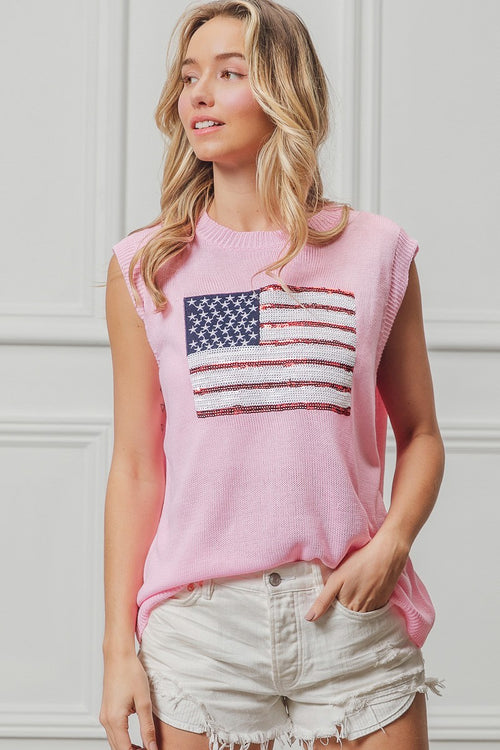 Pink sleeveless knit top with sequined American flag patch on the front