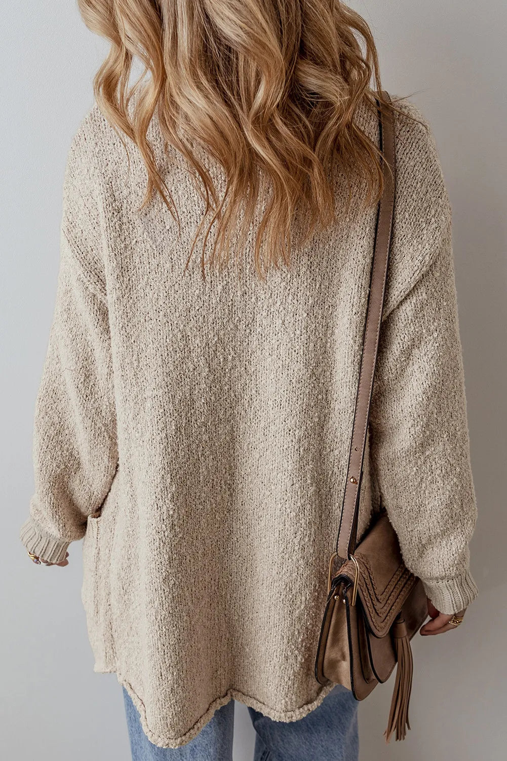 Dust Storm textured cardigan, side view with button placket and patch pockets