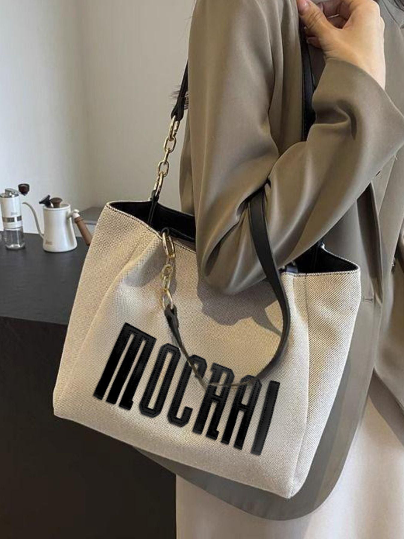 Letter Canvas Shoulder Bag by Trendsi, beige canvas with bold black lettering and chain strap, medium