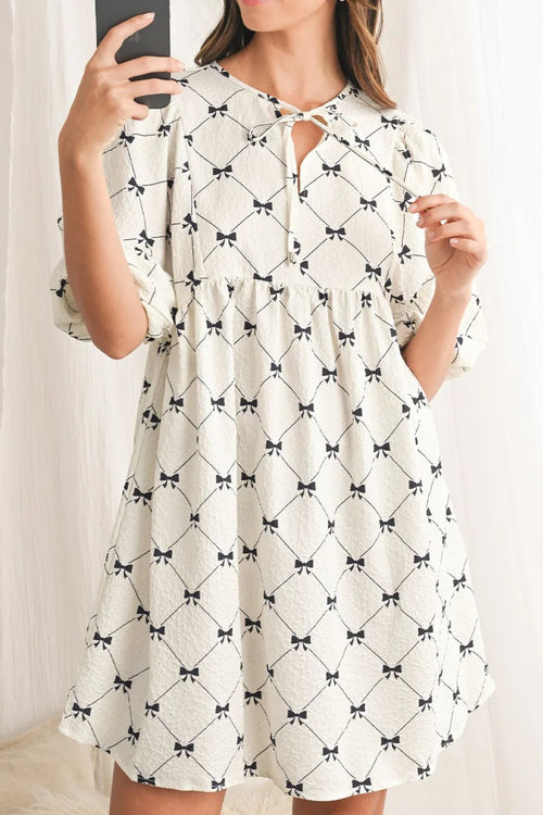 White bow print tie-neck half sleeve dress with black ribbon pattern