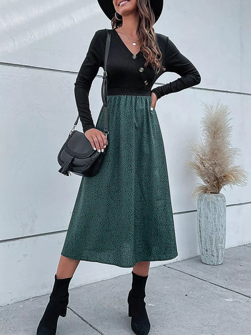 Black V-neck long-sleeve midi dress with buttons and dark green animal-print skirt