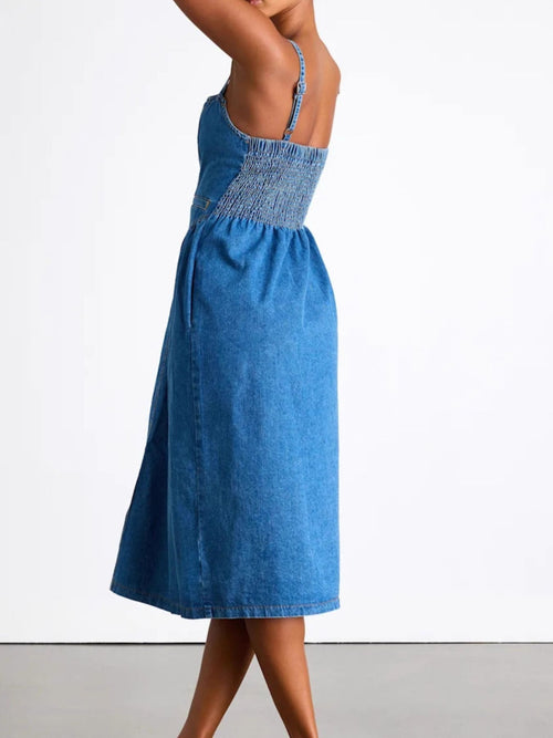 Dusty blue denim midi dress with button details and smocked back straps