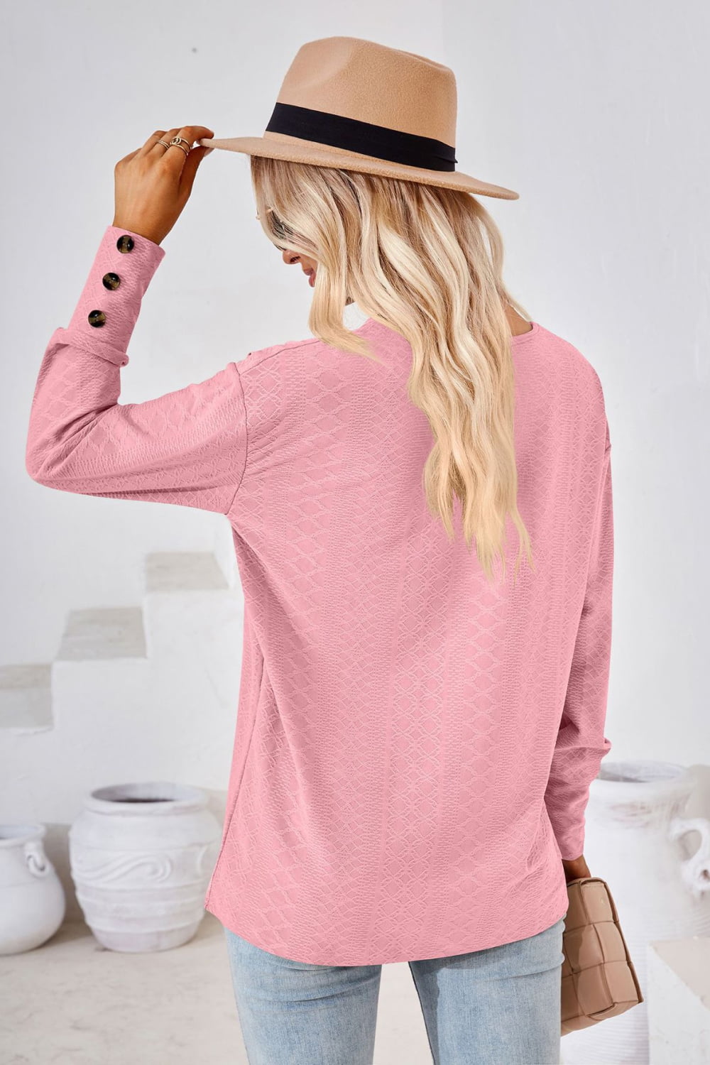 Dusty pink V-neck long-sleeve blouse, back view, textured diamond pattern, relaxed fit