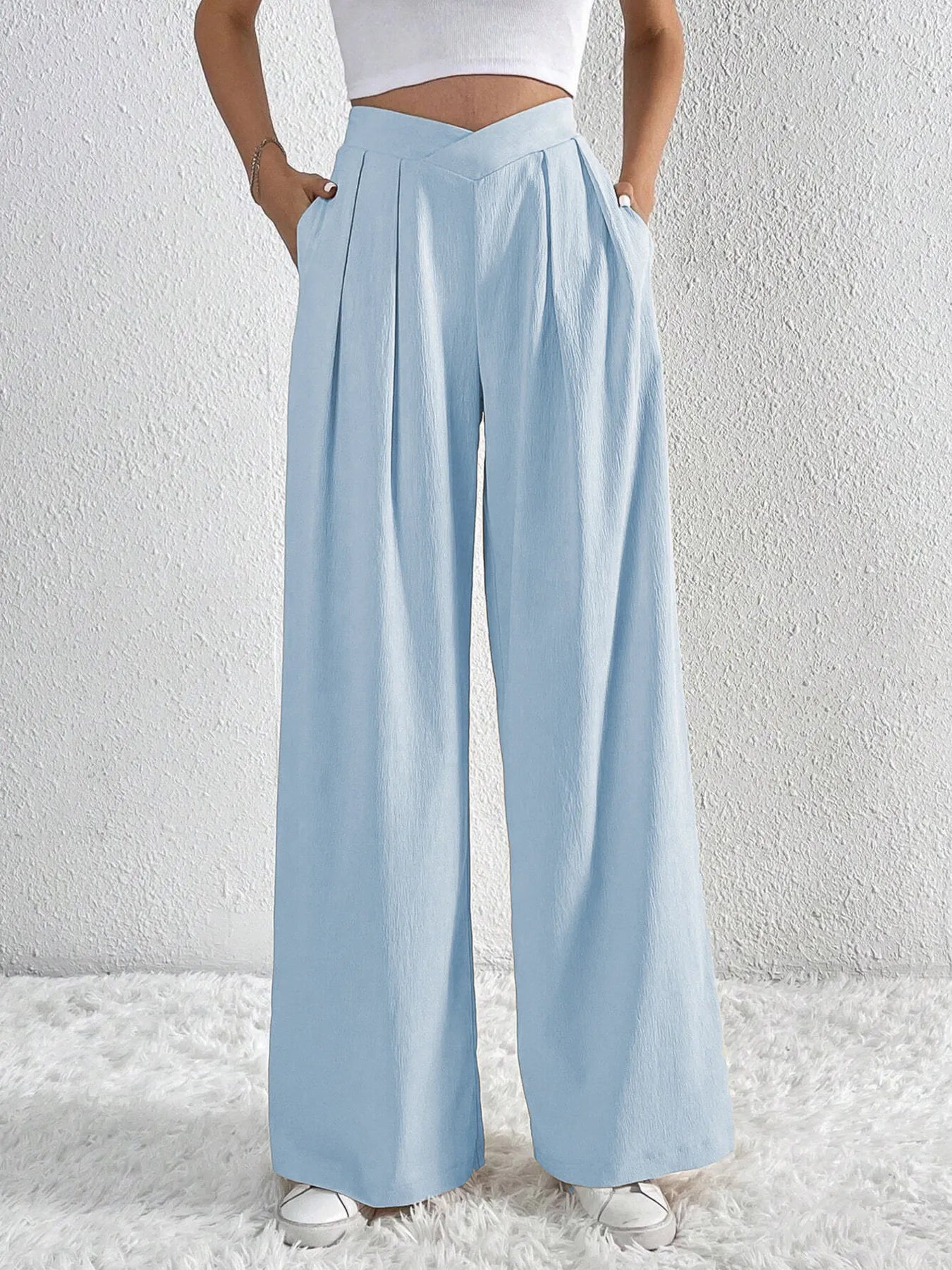 Light blue wide-leg pants with V-waist ruched front and relaxed high-rise fit