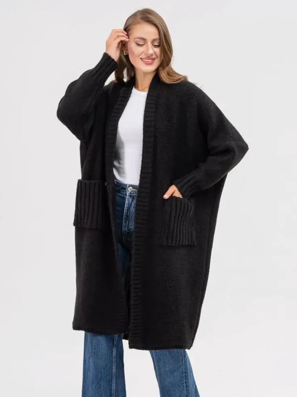 Black longline open-front cardigan with long sleeves and front pockets