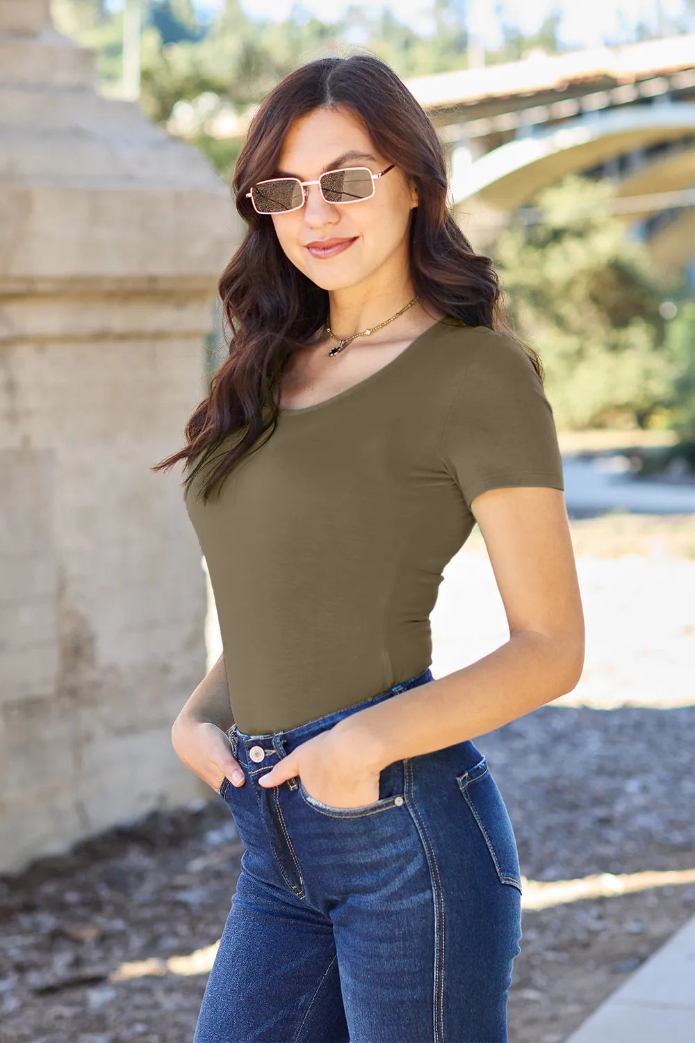 Olive short-sleeve round-neck full-size bodysuit, front close-to-the-body fit