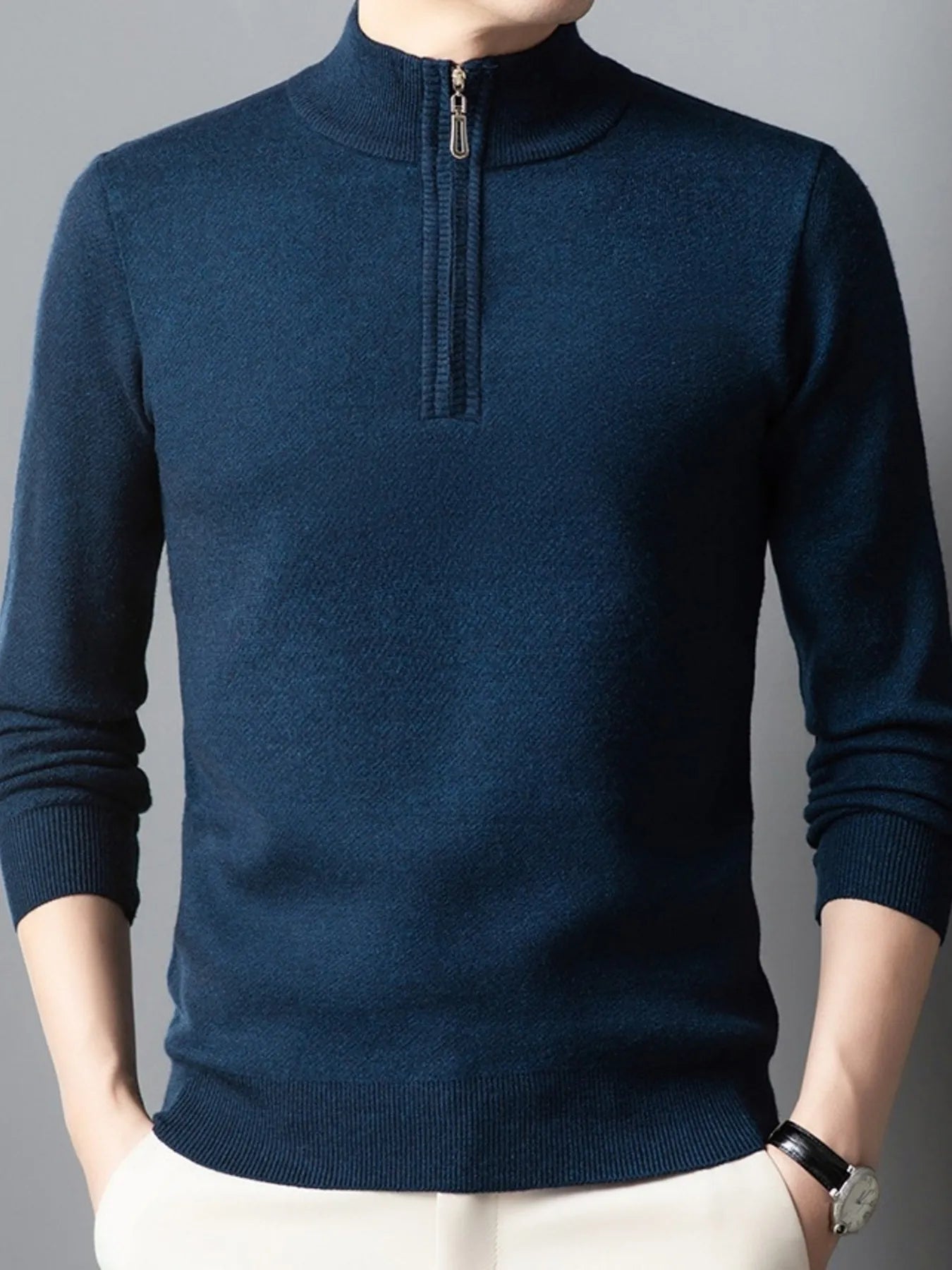 Navy quarter-zip long-sleeve sweater with mock neck and zippered chest placket