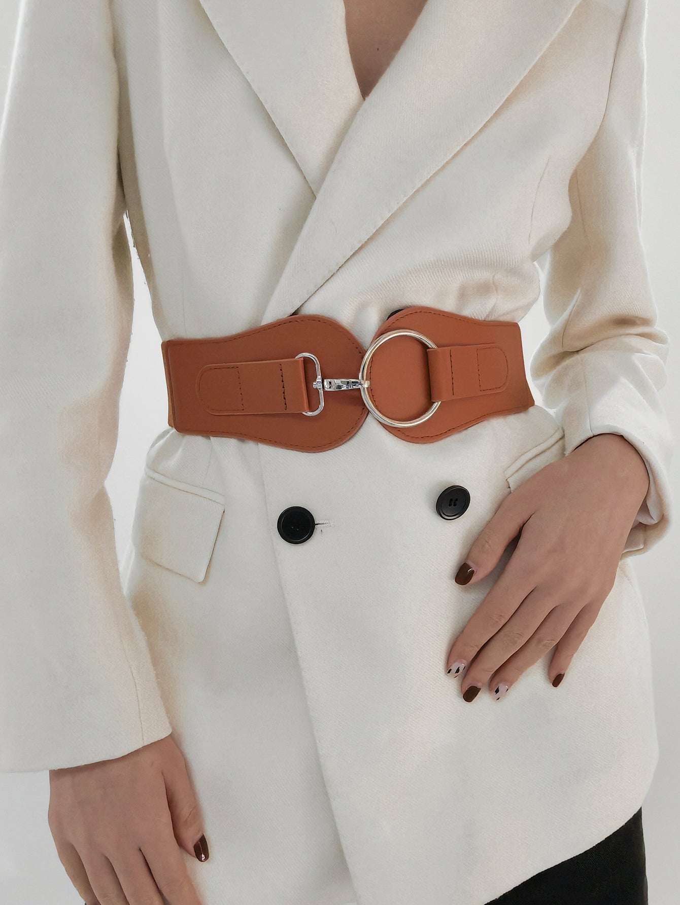 Caramel vegan leather wide elastic belt with O-ring buckle centered on waist