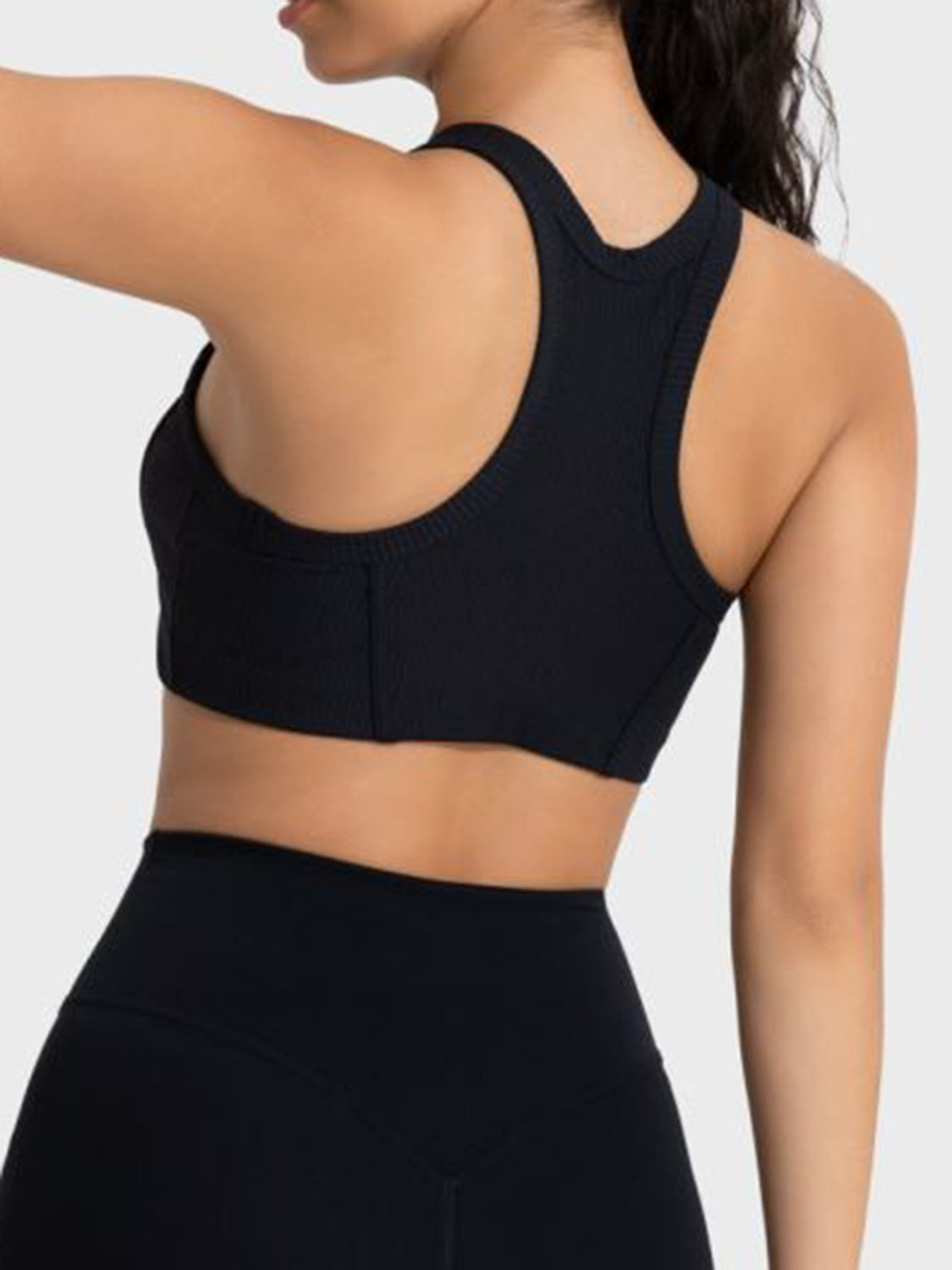 Black cropped sport tank with wide open back and ribbed knit