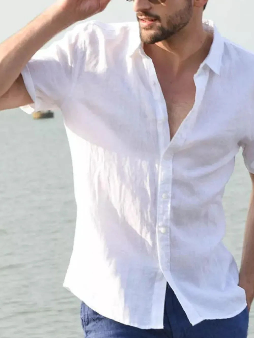 Men's short-sleeve button-down shirt, white, open collar with front buttons