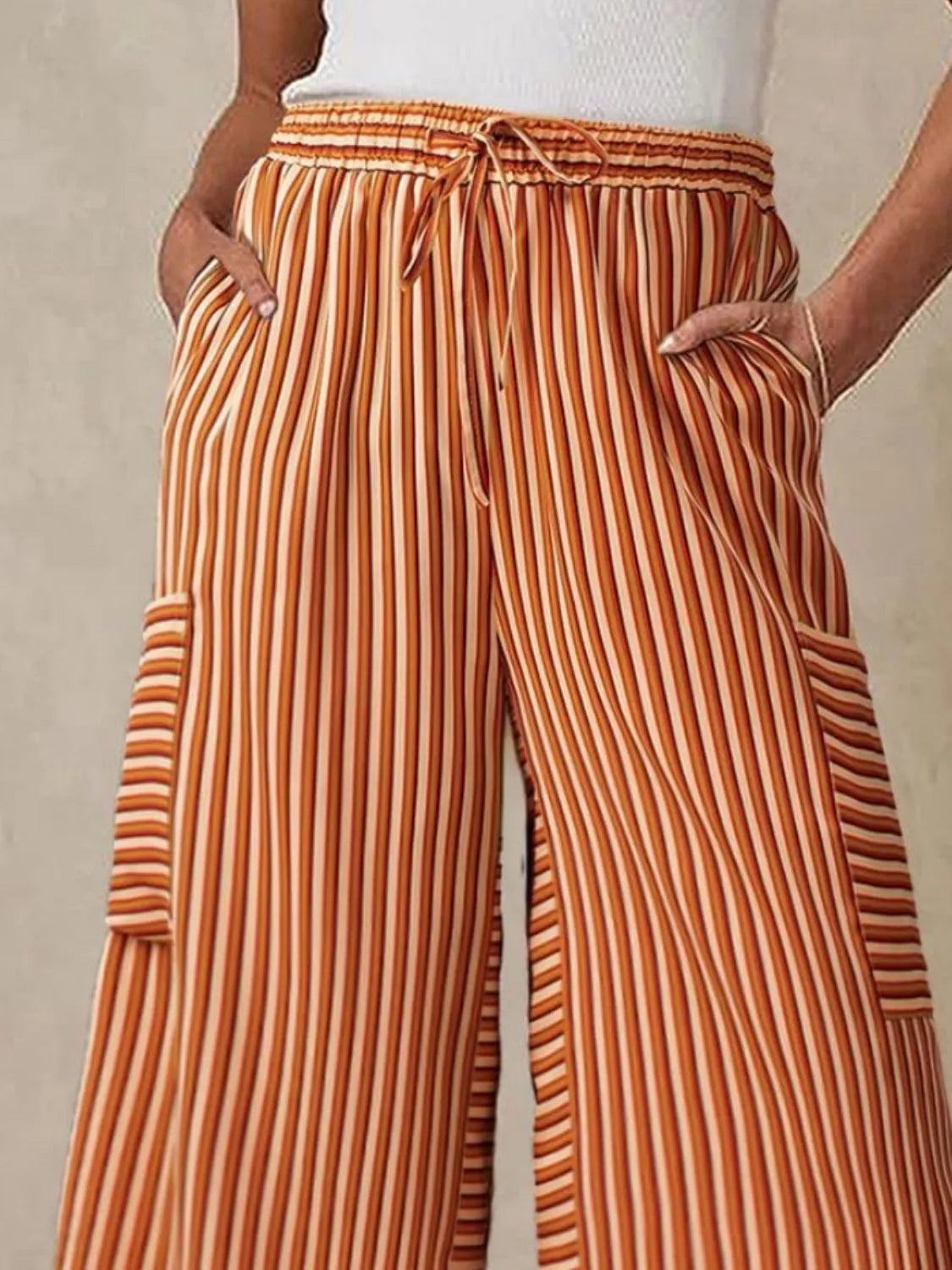 Orange and cream vertical striped wide-leg pants, elastic waist with drawstring