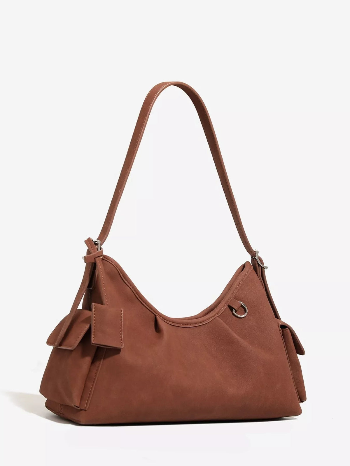 Brown suede ruched shoulder bag with top handle, side straps, and metal ring hardware