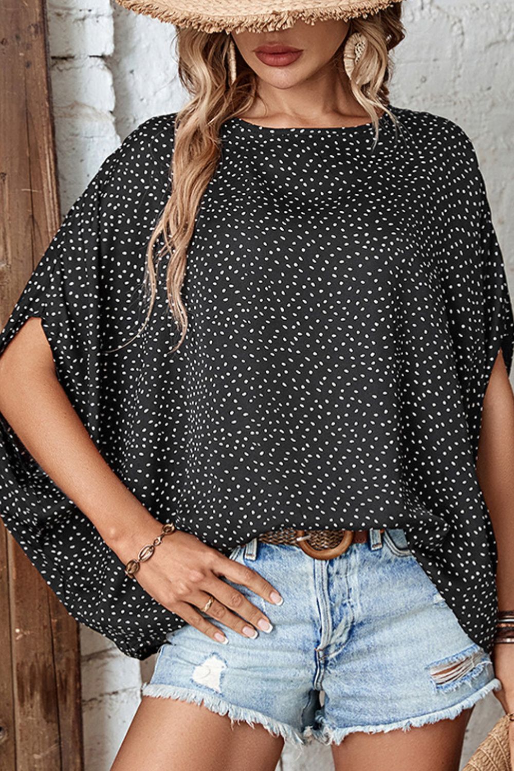 Black printed dolman sleeve blouse with round neck and white speckle dots