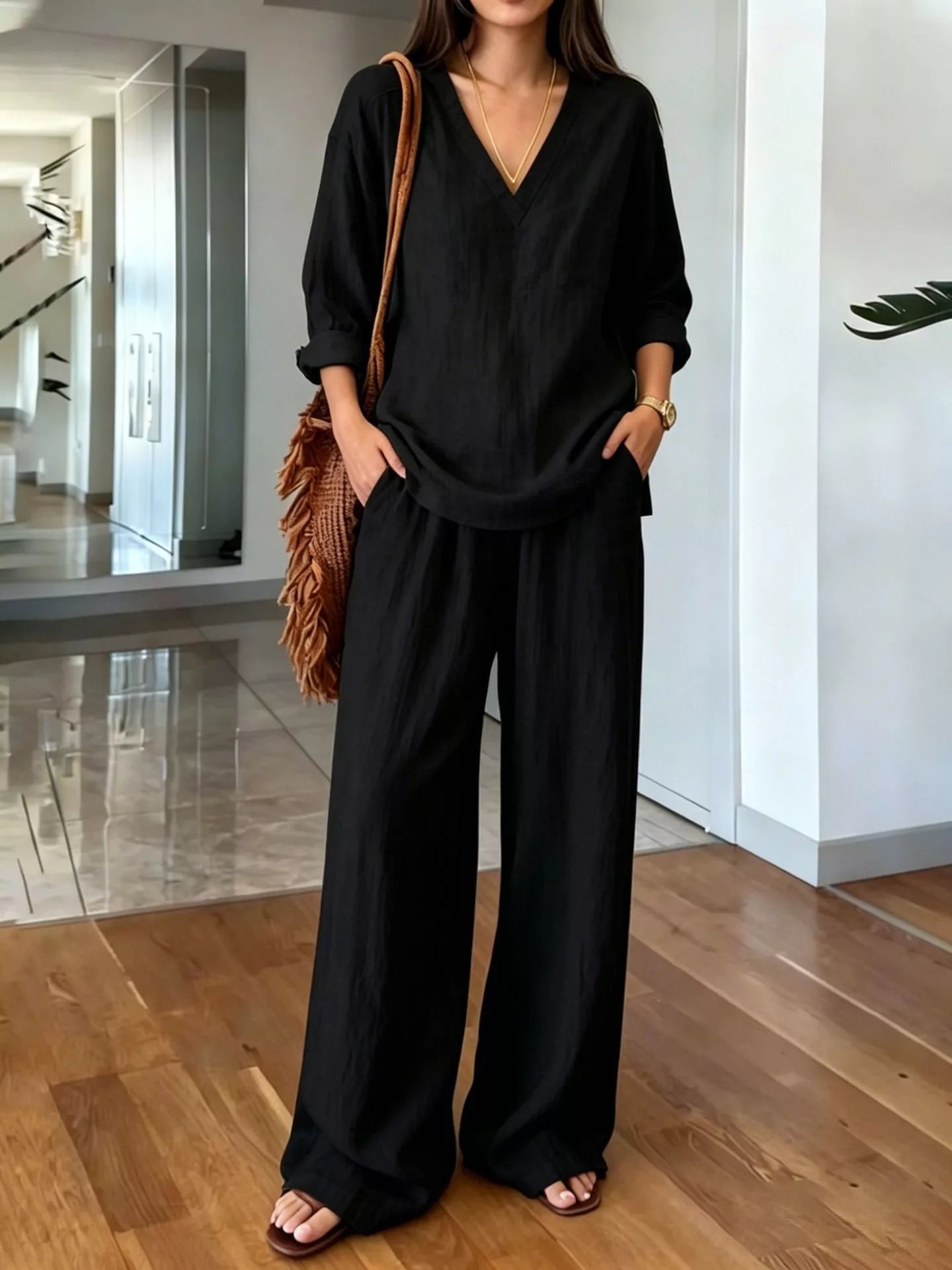 V-neck top and wide-leg pants set in black, relaxed V-neck top and wide-leg pants