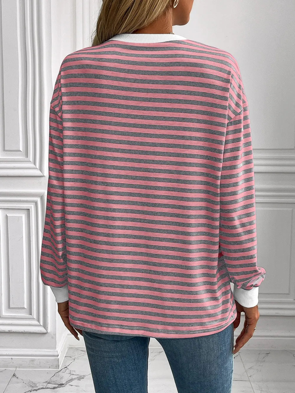 Striped long-sleeve sweatshirt, back view, dusty pink and dark horizontal stripes